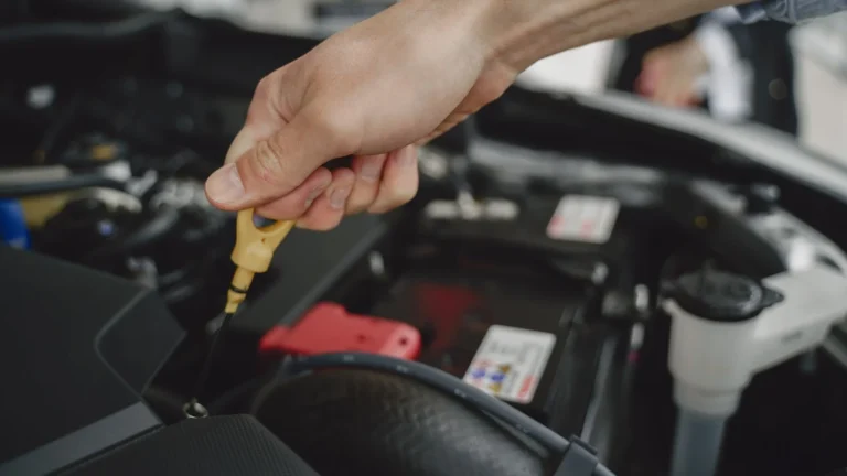 Removing a car door panel to add sound deadening